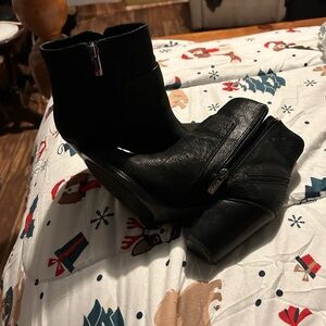 Black leather with block heel and zip inside closure